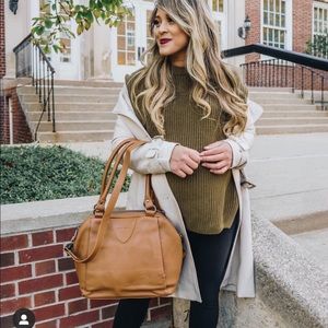 Status anxiety tan bag